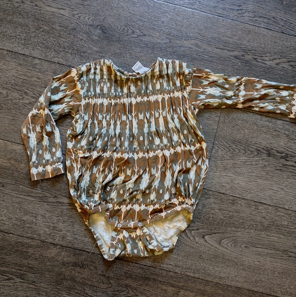Kate Quinn Bubble Onesie